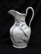 A 19th century Welsh pottery water jug, decorated in the Lazuli pattern,