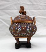 A Japanese cloisonne twin handled Koro, the domed lid with dog of foo,
