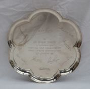 A modern silver salver of lobed form,