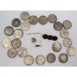 Twenty two Chinese silver coins,