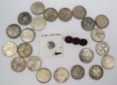 Twenty two Chinese silver coins,