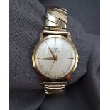 A Gentleman's 9ct yellow gold Rodania wristwatch, the silvered dial with batons,