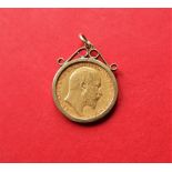An Edward VII gold half sovereign dated 1908 in a 9ct gold mount, approximately 5.