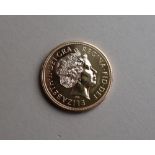 Royal Mint - A 2005 United Kingdom Brilliant Uncirculated Five Pounds gold coin,