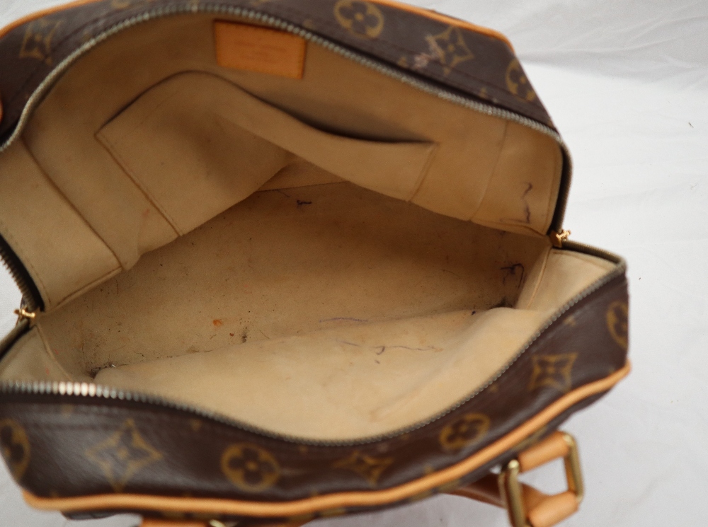 A Louis Vuitton monogram handbag, with leather handles, - Image 14 of 19