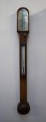 A Negretti & Zambra oak cased stick barometer,