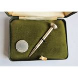 A sterling silver golf tee propelling pencil together with a silver marker,