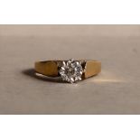 A solitaire diamond ring, the round brilliant cut diamond approximately 0.