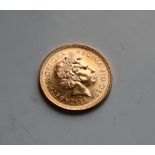 An Elizabeth II gold sovereign dated 2000