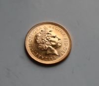 An Elizabeth II gold sovereign dated 2000