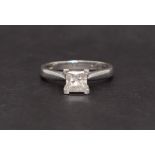 A solitaire diamond ring, set with a princess cut diamond approximately 5mm x 5mm, 0.