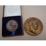 Abraham Lincoln interest - a presidential medal, depicting a relief but of Abraham Lincoln,