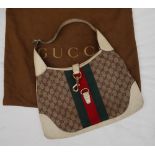 A Gucci Monogram Hobo handbag,