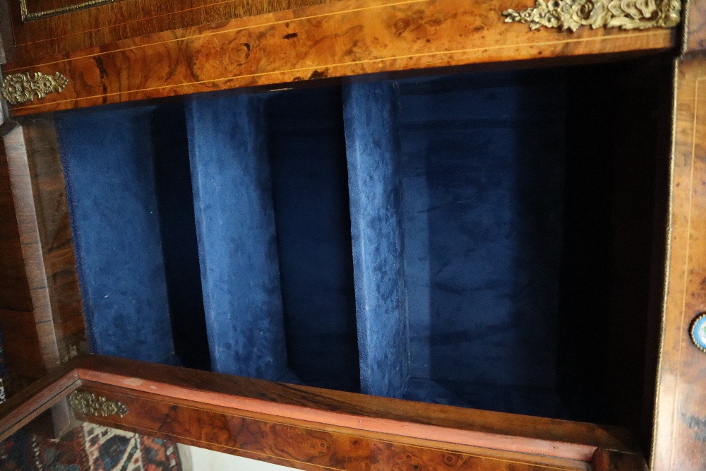 A Victorian walnut credenza the breakfront top with ebonised edge above a central cupboard and two - Image 9 of 16