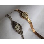 A lady's 9ct yellow gold wristwatch, the rectangular dial with numeral,