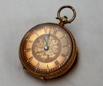 An 18ct yellow gold fob watch, the gilt dial with Roman numerals , the centre engraved with flowers,