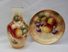 A Royal Worcester bone china baluster vase painted with peaches and grapes, signed Roberts,