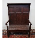 An 18th century and later oak settle,