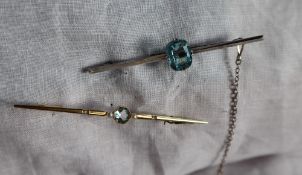 An aquamarine seed pearl and diamond set bar brooch to a yellow metal setting, approximately 3.