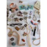 Assorted costume jewellery including brooches, earrings, bangle, rings, faux pearls,