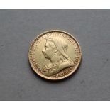 A Victorian gold sovereign dated 1893