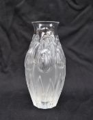 A Lalique tulip pattern glass vase of baluster form, inscribed mark to the base Lalique France, 17.