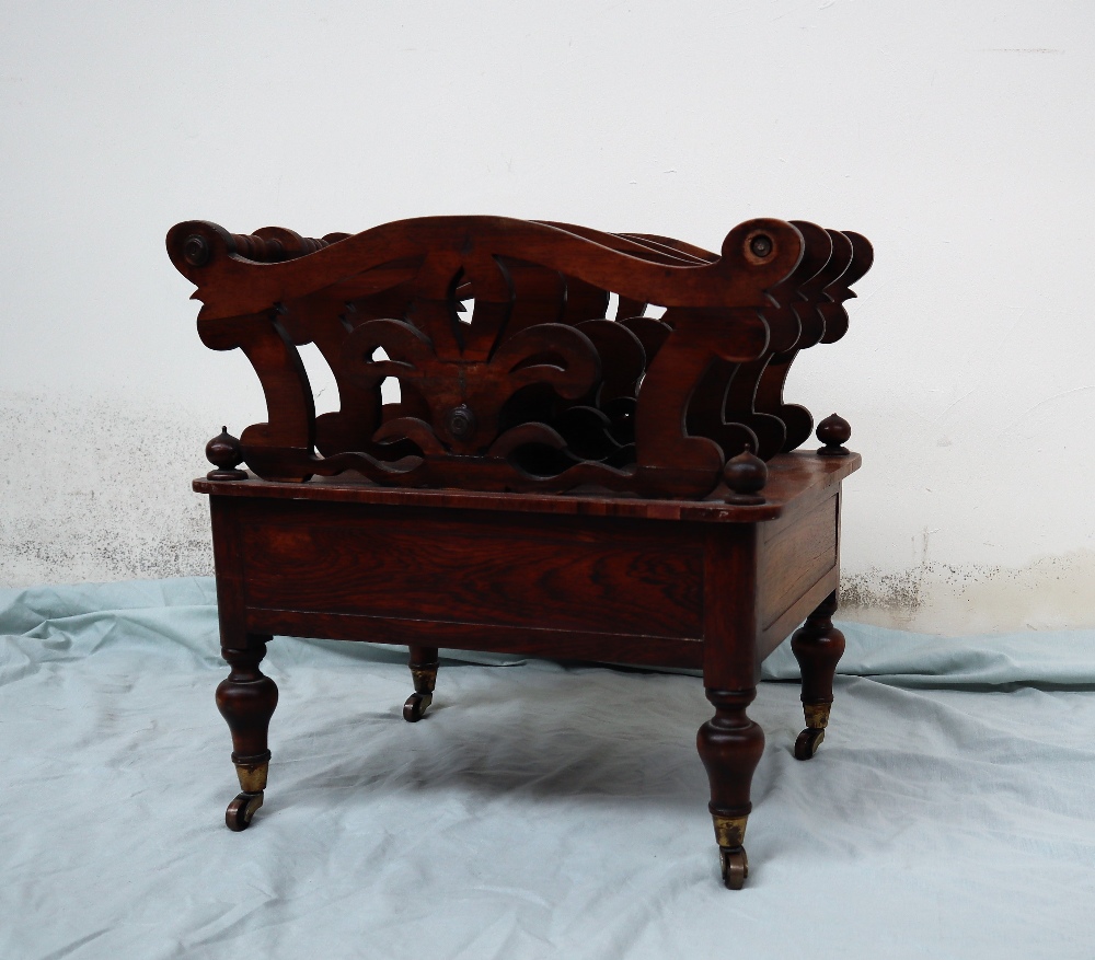 A Victorian rosewood Canterbury with three sections,