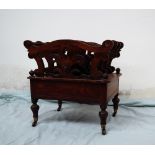 A Victorian rosewood Canterbury with three sections,