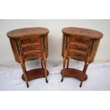 A pair of continental kidney shaped walnut side tables,