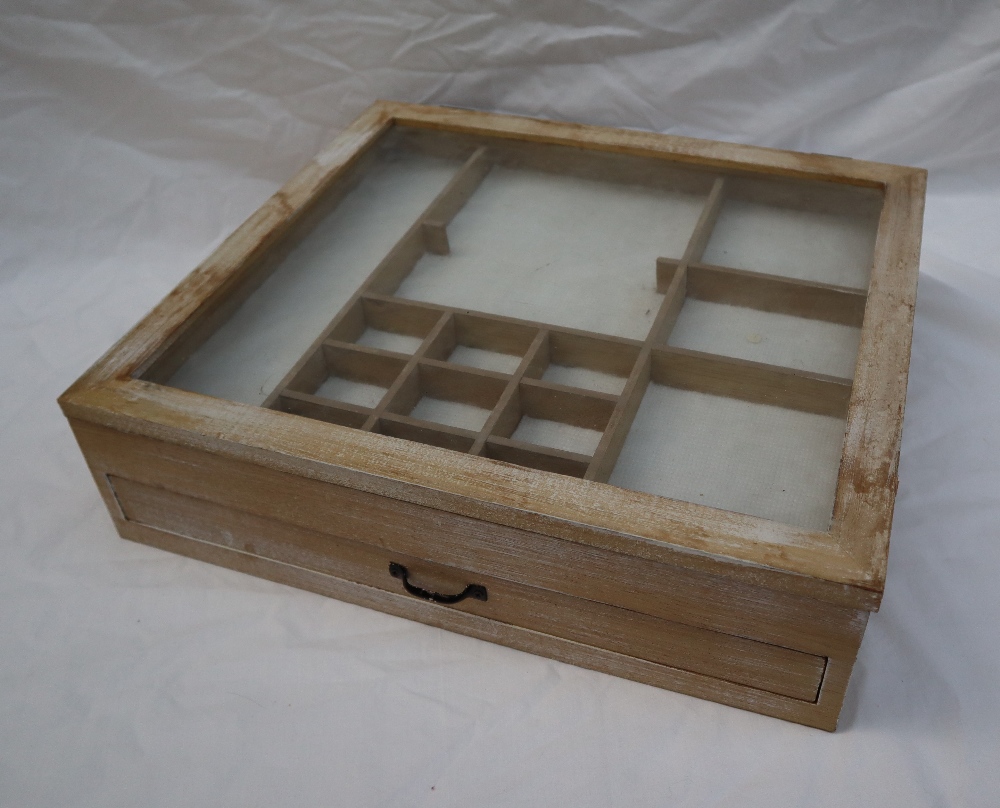 A small table top display cabinet, with a glazed top and sectional interior, above a base drawer, - Image 3 of 3