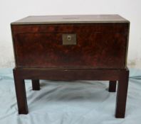 A Victorian burr walnut writing slope, of rectangular form with brass inlay and stringing,