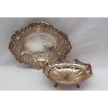 An Elizabeth II silver bon bon dish of oval pierced form embossed with flowerheads and scrolls,