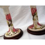 A pair of Moorcroft pottery candlestick table lamps,