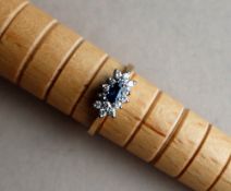 A sapphire and diamond ring,