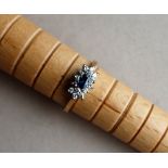 A sapphire and diamond ring,