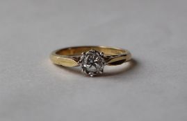 A solitaire diamond ring, the round old cut diamond approximately 0.