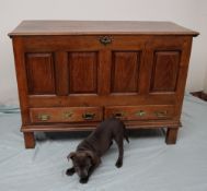 An 18th century oak coffer,