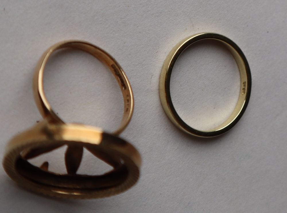 An 18ct yellow gold wedding band, size O 1/2, approximately 3 grams together with a 9ct gold ring, - Image 2 of 2