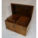 A Victorian walnut tea caddy, of domed form, the interior with two removable lidded compartments,