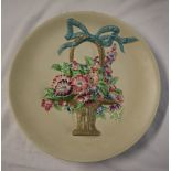 A Clarice Cliff pottery charger, moulded with a vase of flowers, printed mark,