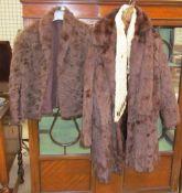 A fur coat together with fur stoles