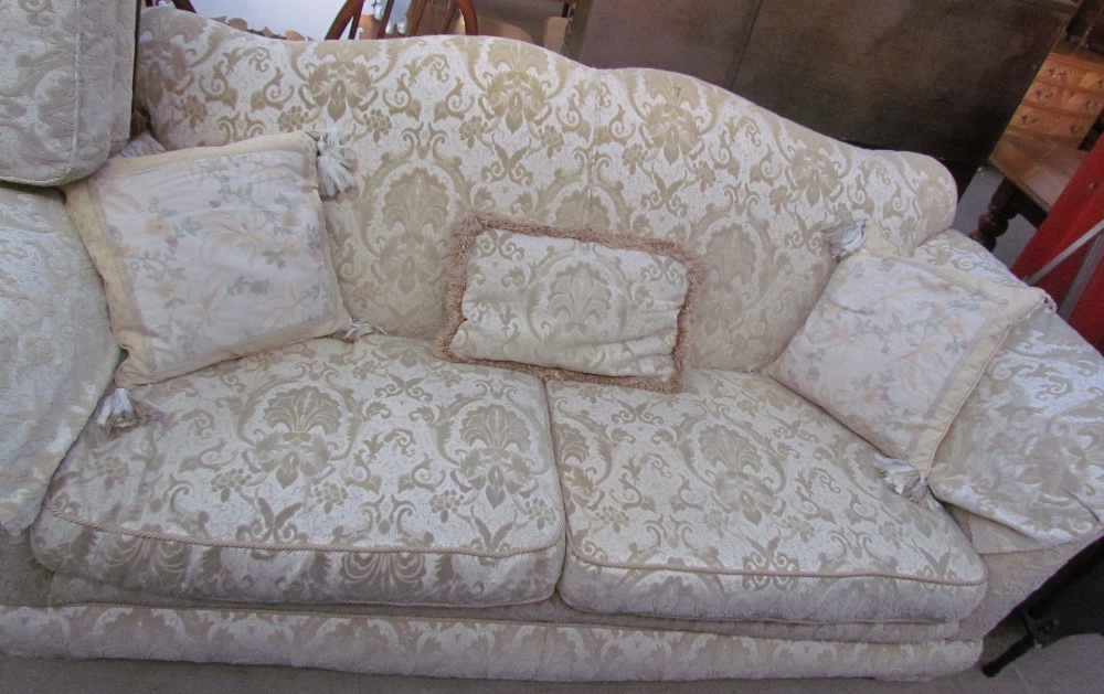 A pair of floral upholstered three seater settees together with a foot stool - Bild 2 aus 3