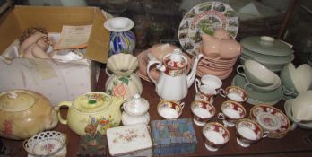 A Royal Albert Lady Hamilton part tea set together with a Poole pottery part dinner set,