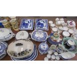 Blue and white pottery tureens together with part tea sets, Wedgwood plates,