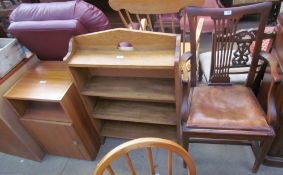 A George III style mahogany elbow chair together with an oak bookcase and a pot cupboard