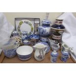 A blue and white pottery table lamp together with a faux oil lamp, blue and white part tea set,