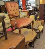 An Edwardian inlaid occasional table together with two elbow chairs, a whatnot,