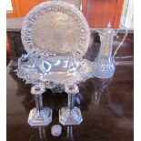 A pair of silver desk candlesticks together with an electroplated swing handled cake basket,
