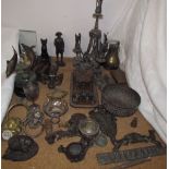 Bronze dolphins together with other bronze and metal items including an epergne,