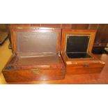 A Victorian walnut laptop desk with an inset writing slope together with another smaller example